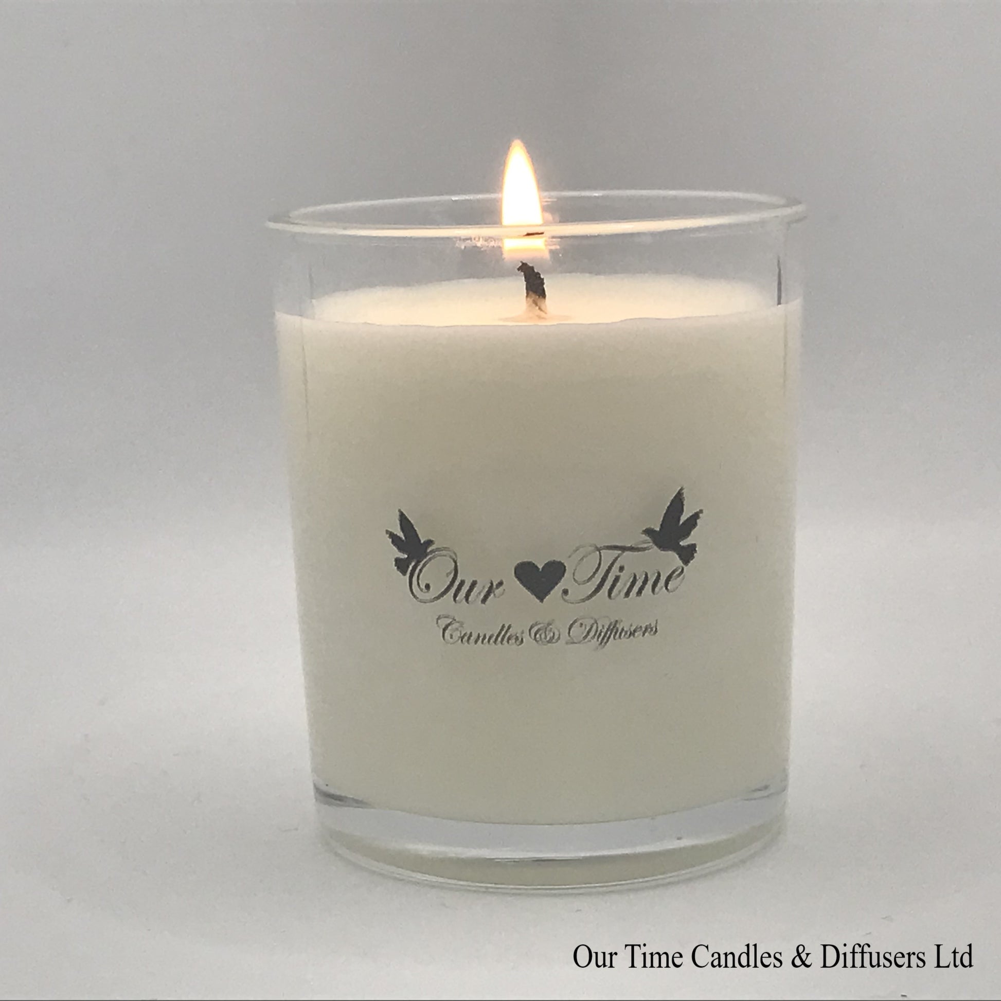 Medium soy wax filled candle with flame