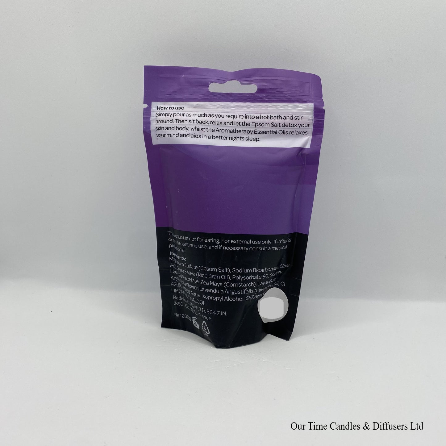 Lavender bath soak powder in a purple resealable bag