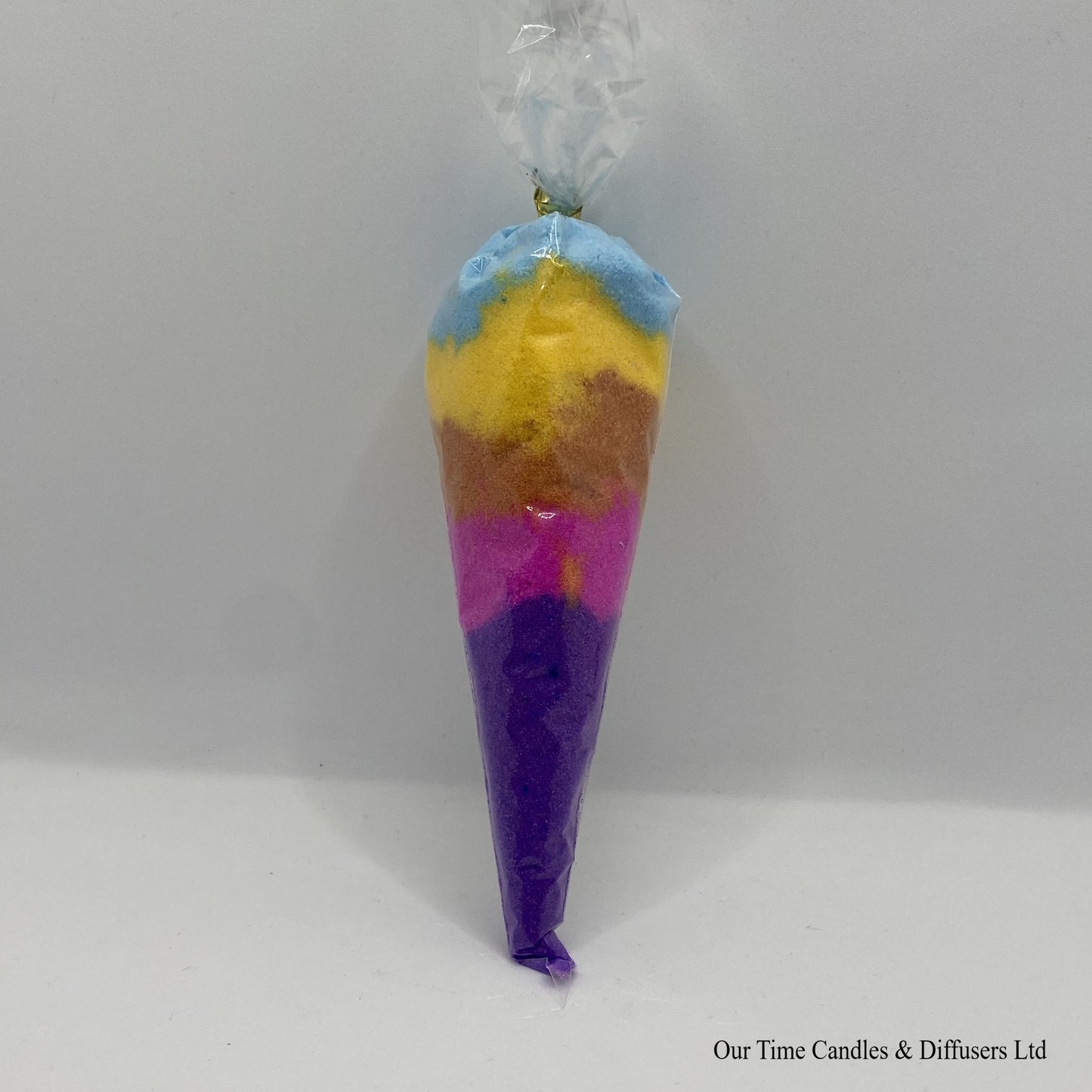 Multi coloured bath dust in a cone shaped bag