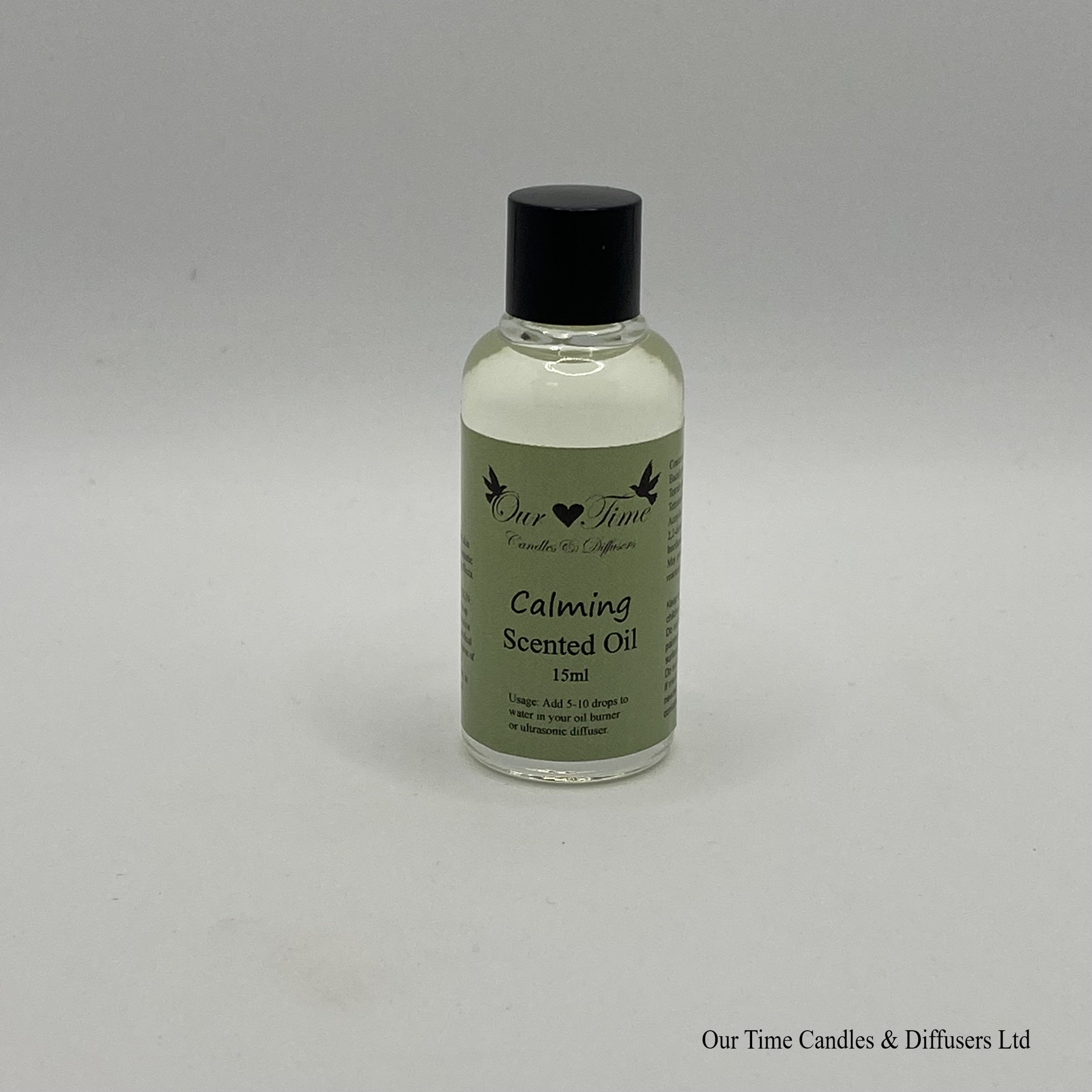 Scented Oil in a clear bottle with black cap for use in oil burners or aroma diffusers