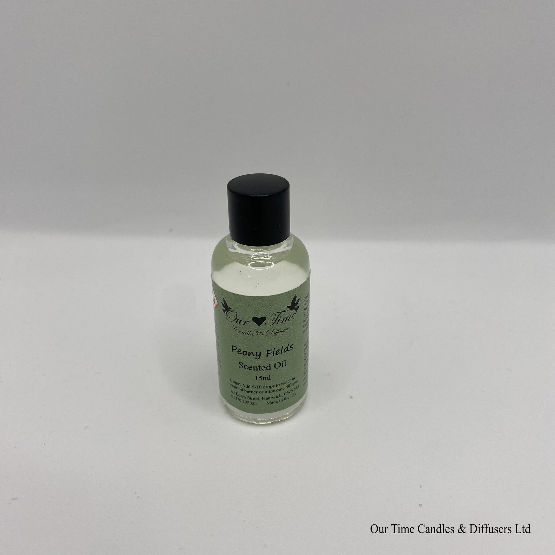 Scented Oil 15ml in clear bottle with black screw cap