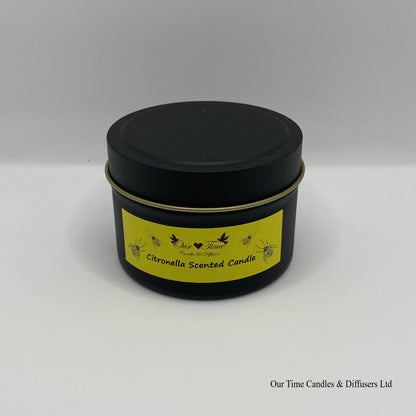 Citronella scented candle in a black tin with yellow label