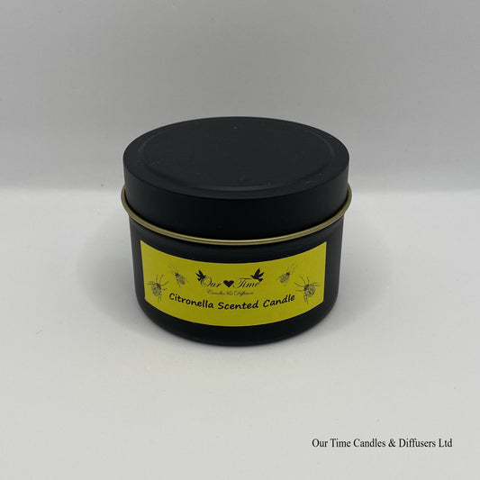 Citronella scented candle in a black tin with yellow label