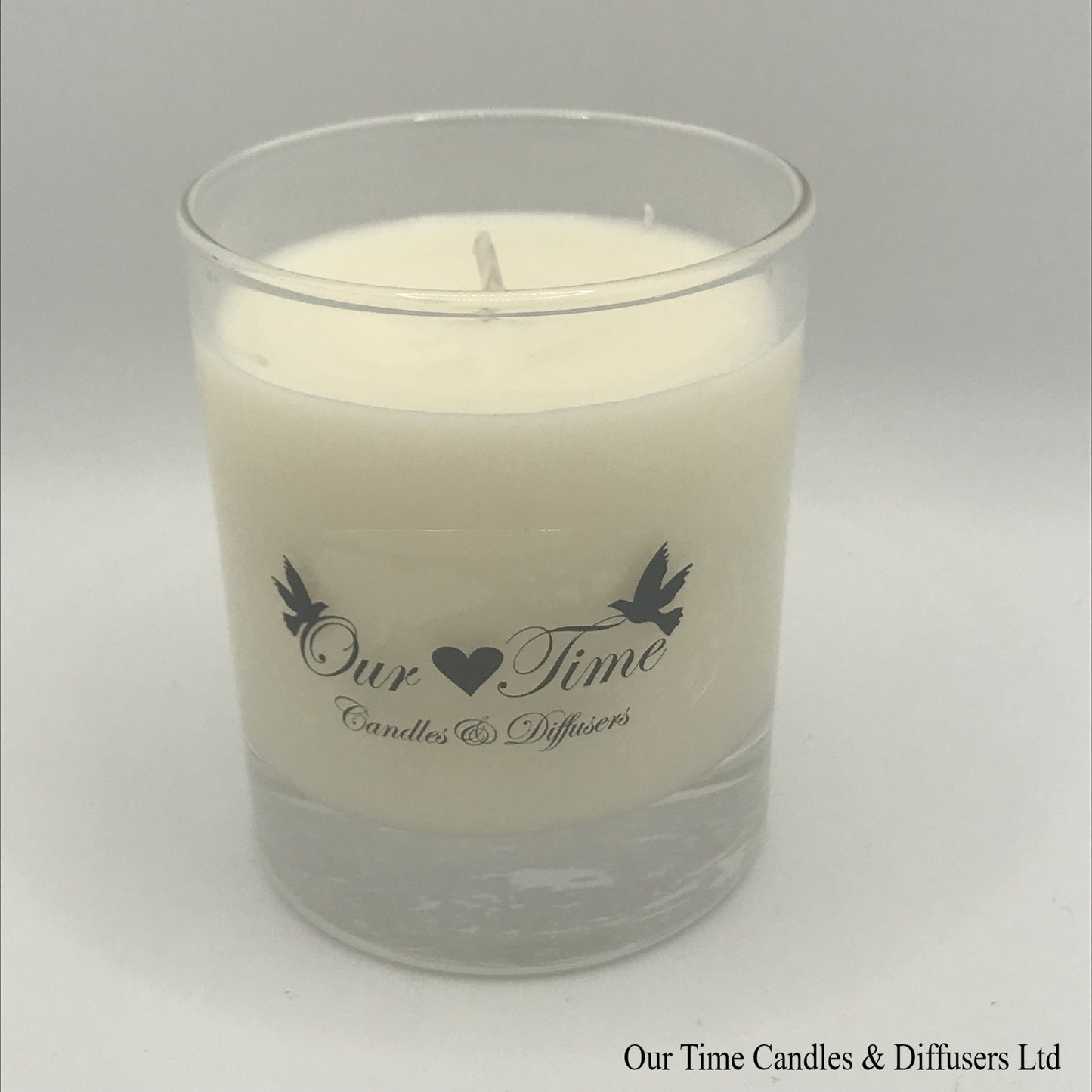 Sweet Violet scented wax filled candle