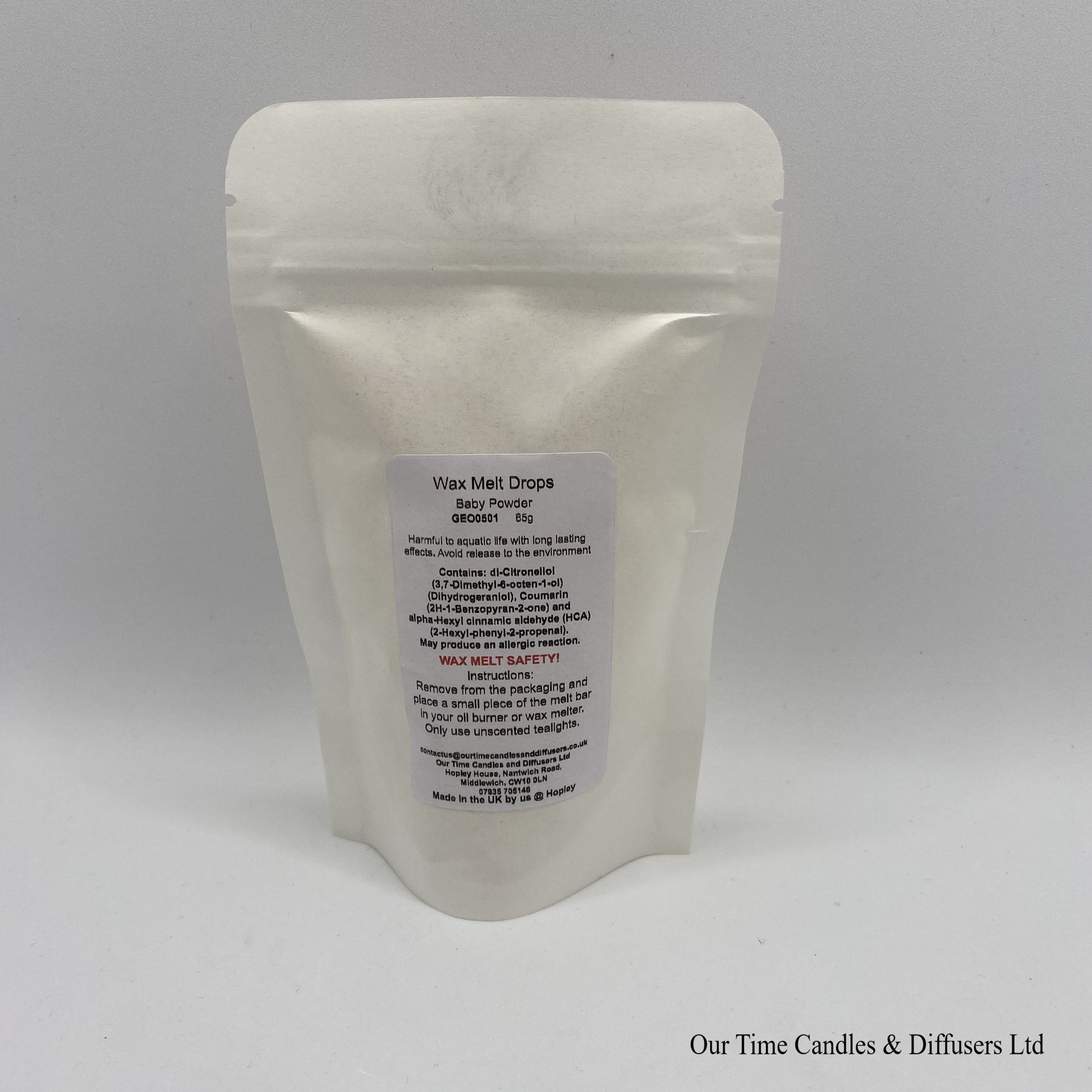 Baby Powder scented soy wax melt drops in a white bag